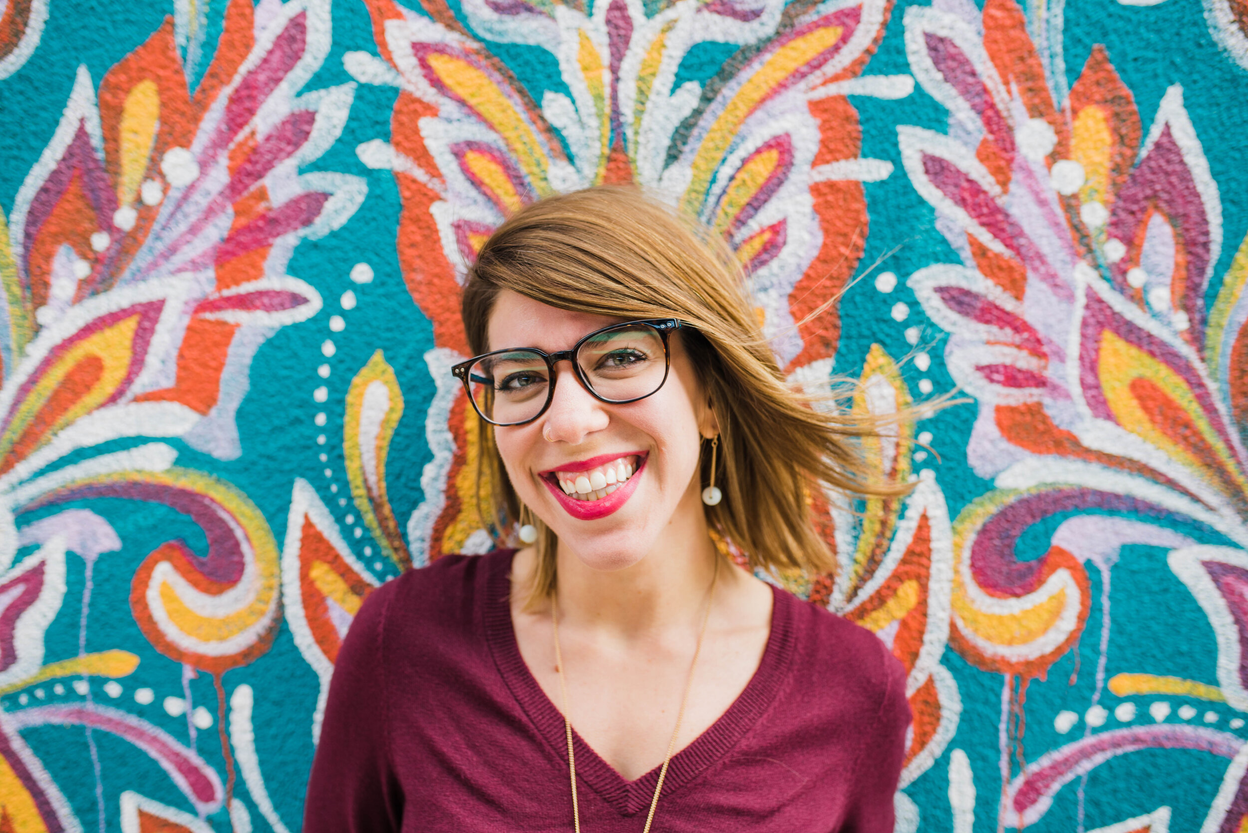 Romance author Kathryn Nolan wanted some updated headshots for her website, social media and book covers. We chatted about her brand and overall boho vibe, so I knew the perfect spot for her session would be the colorful murals around Fishtown.