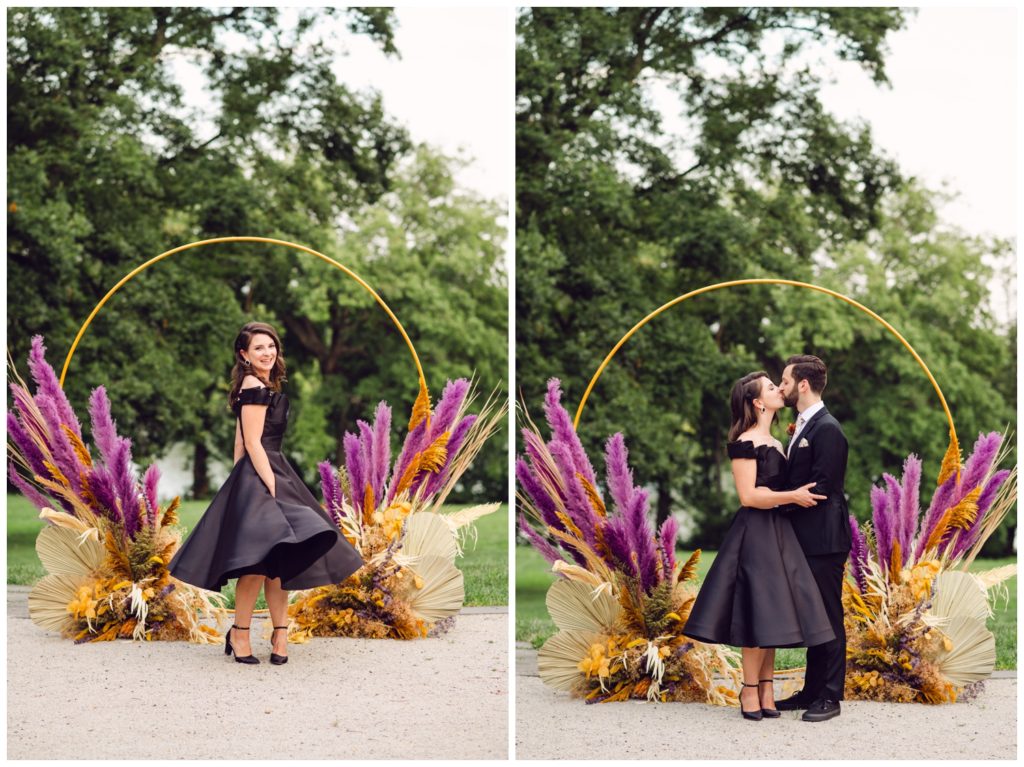 The bride spins to show off her black dress for the Bartram's Garden wedding