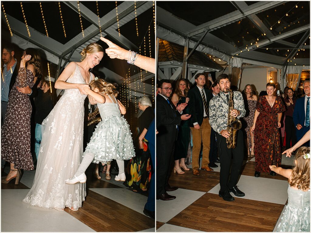 A bride swings a flower girl on the dance floor.