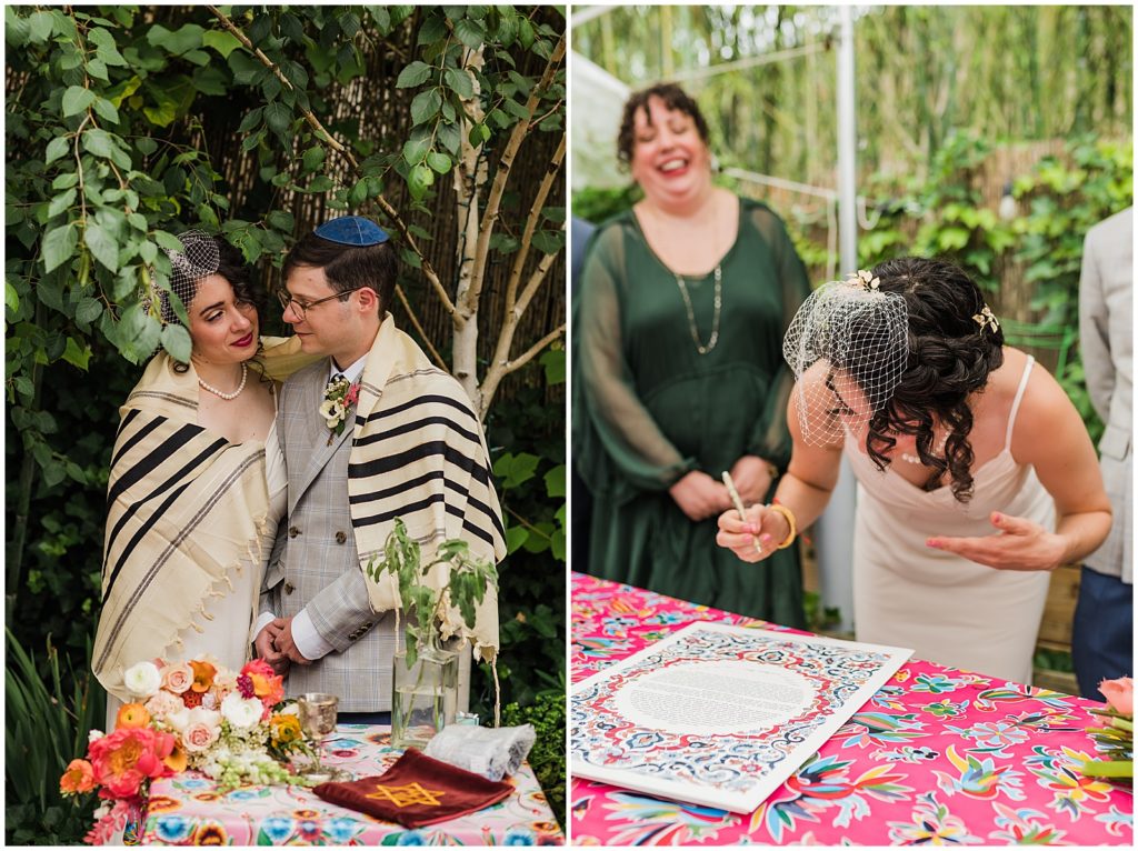A bride leans over a table to sign a ketubah.