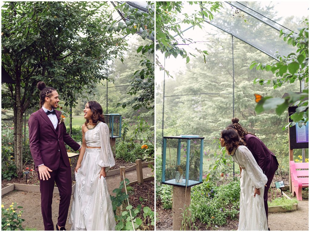 A couple explores the butterfly house at their Tyler Arboretum wedding.
