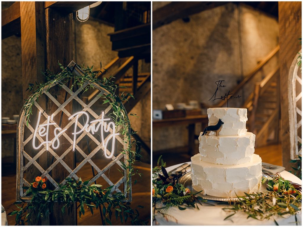 The wedding cake sits beside a custom neon light.