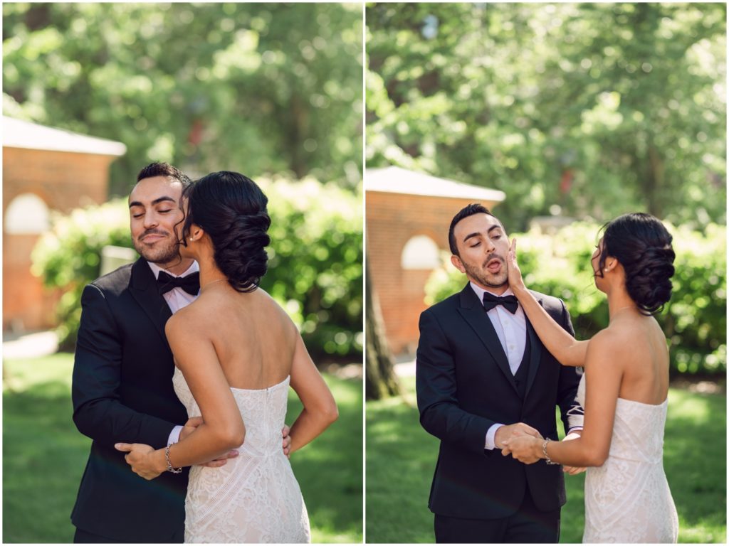 A bride wipes lipstick off a groom's cheek at their Philadelphia wedding.