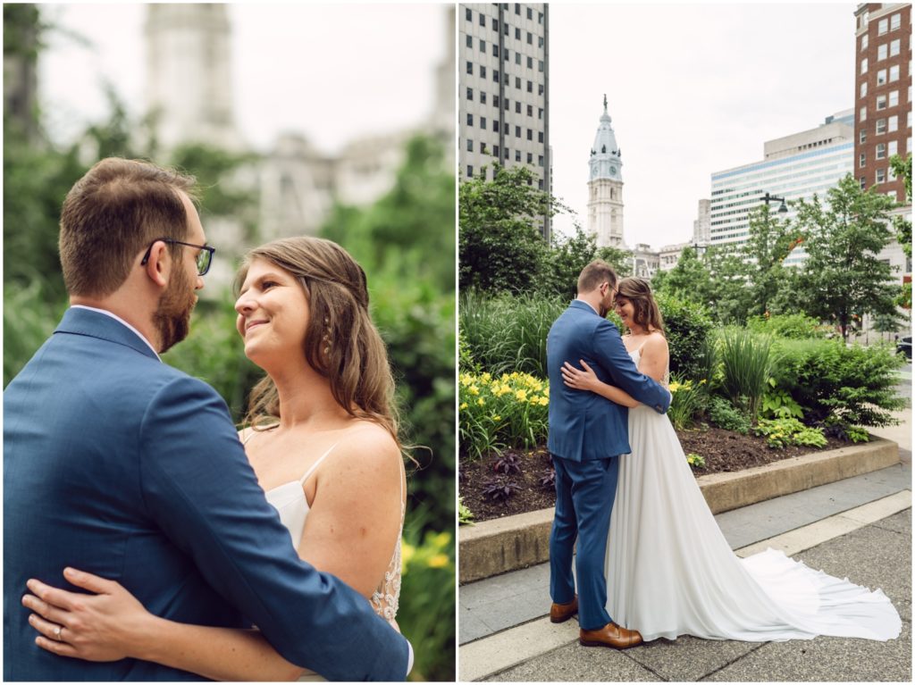A man and woman in wedding attire embrace before their Philadelphia wedding.