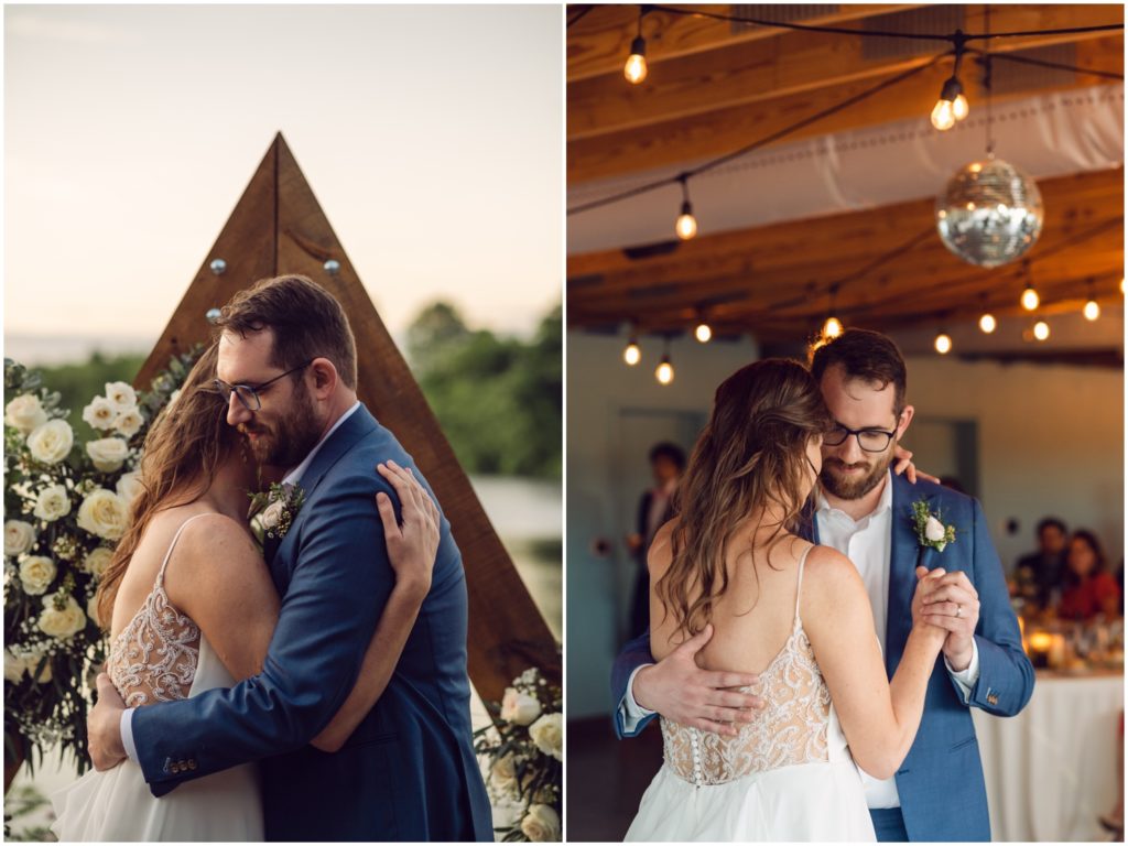 A couple in wedding attire embraces in front of a triangular arbor.