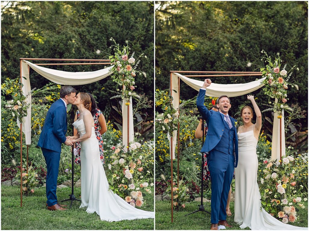 A bride and groom share their first kiss in the Duke Sculpture Garden wedding.