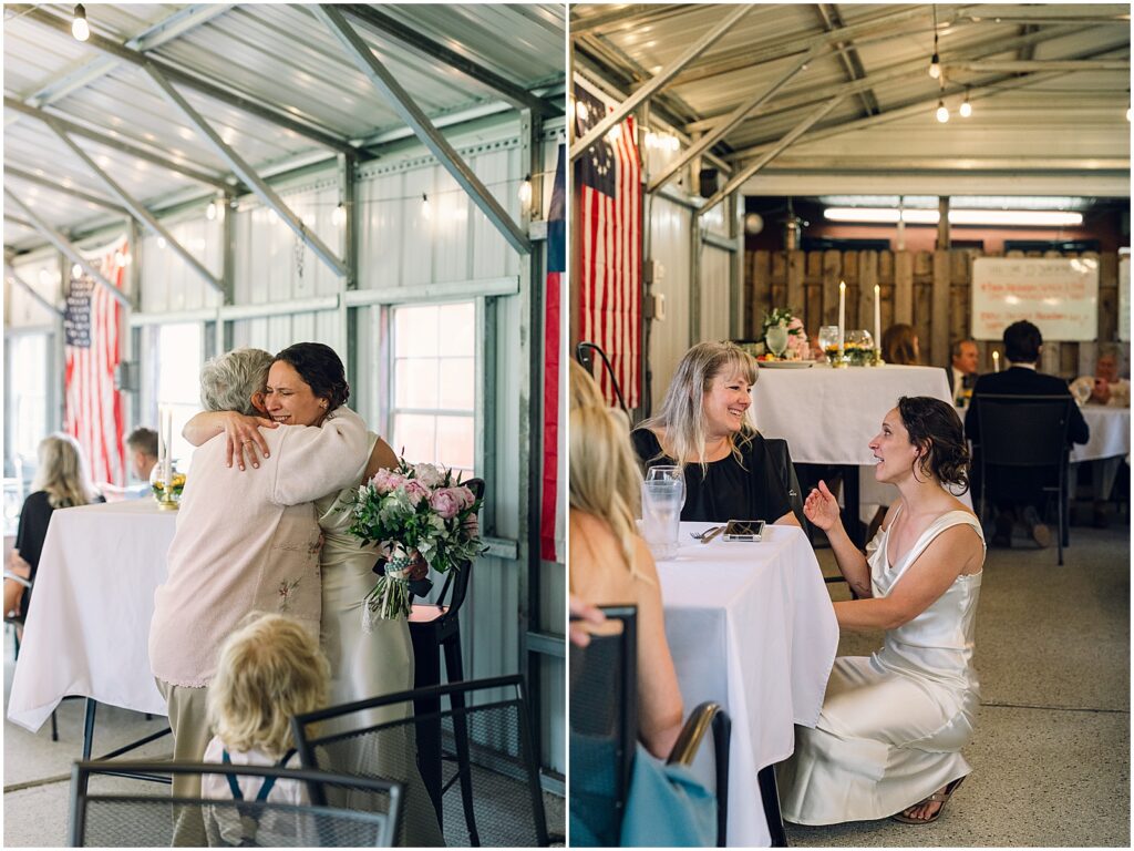 A bride greets guests inside a diner.