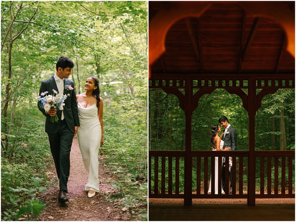 A bride and groom hold hands and walk down a wooded path in Bowman's Hill Wildflower Preserve