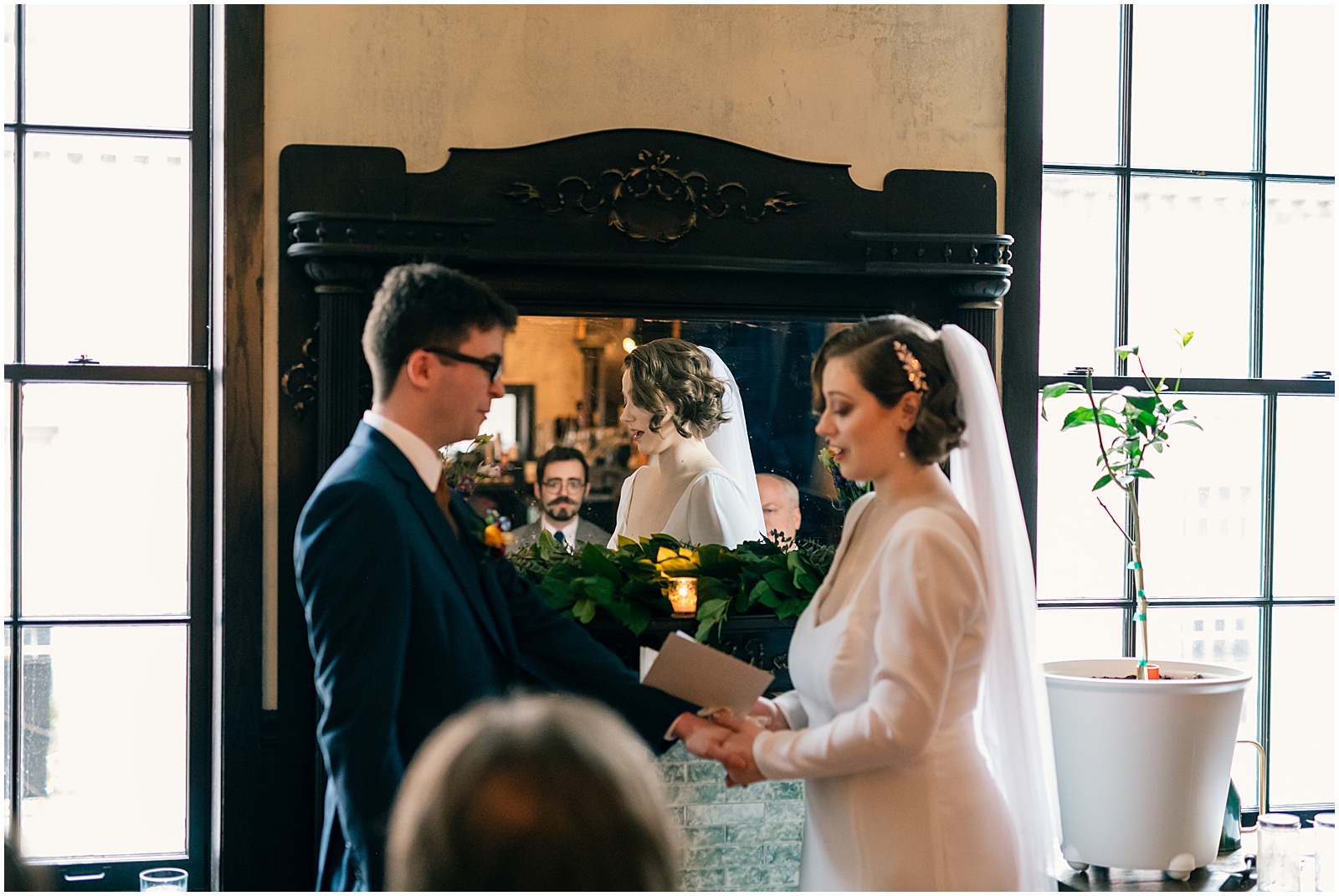 A bride reads her vows at a Royal Boucherie wedding.