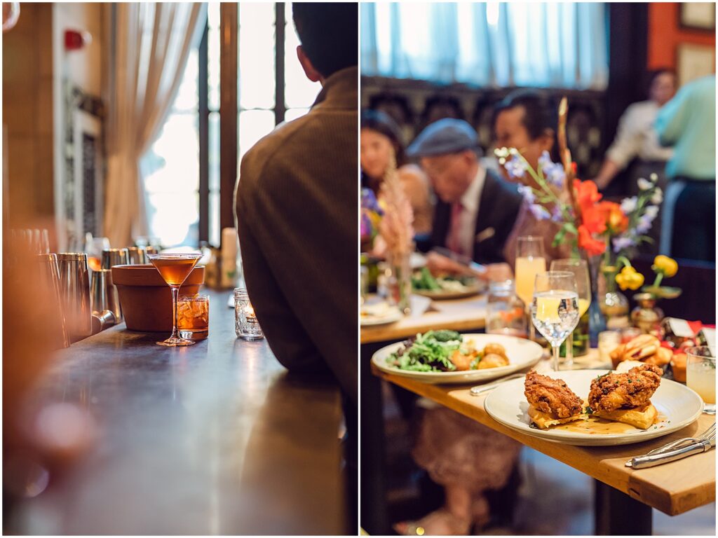 Wedding guests sit down to eat a family-style meal.