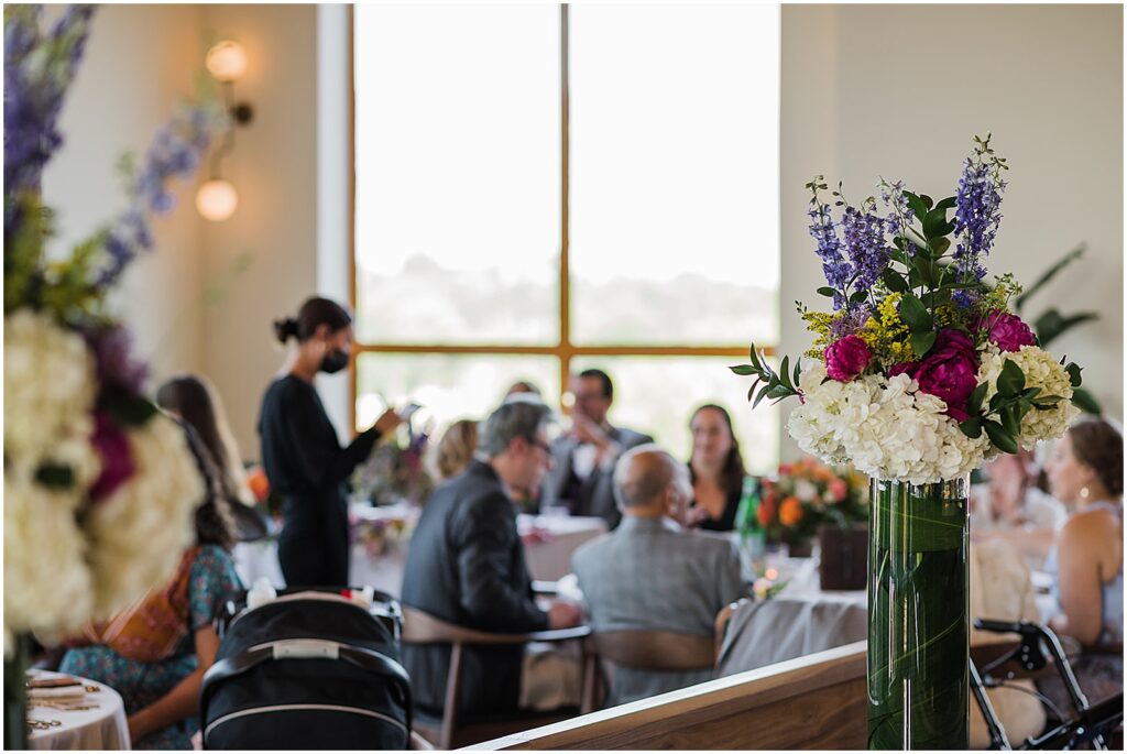 A waiter takes orders from wedding guests in Lark.