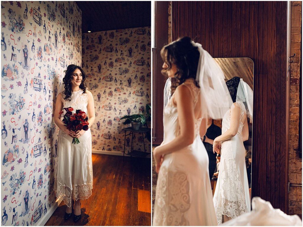A bride poses beside a wall decorated with vintage wallpaper in Lilah Philadelphia.