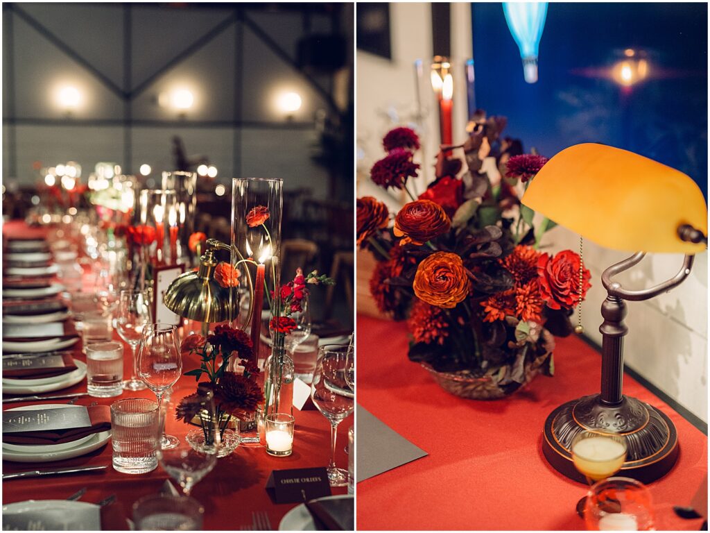 Red flowers and vintage lamps decorate a reception table in Lilah Philadelphia.