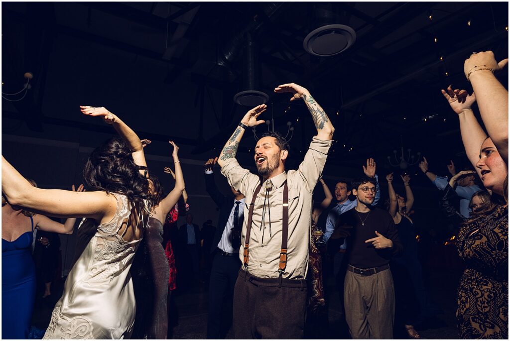 Wedding guests dance to Hot to Go.