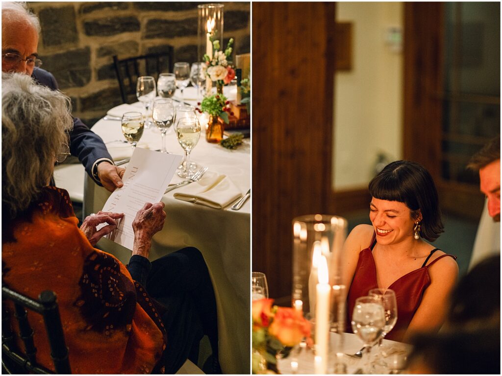 Wedding guests sit down at their reception tables.