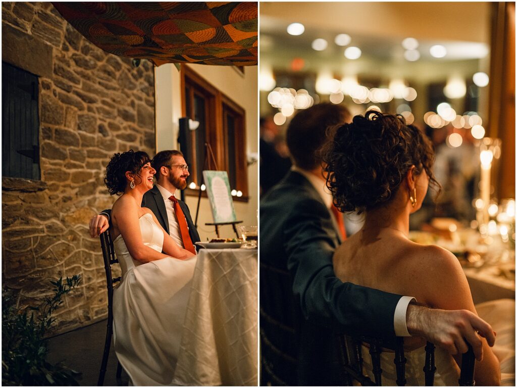 A bride and groom sit and listen to speeches at a Knowlton Mansion wedding reception.