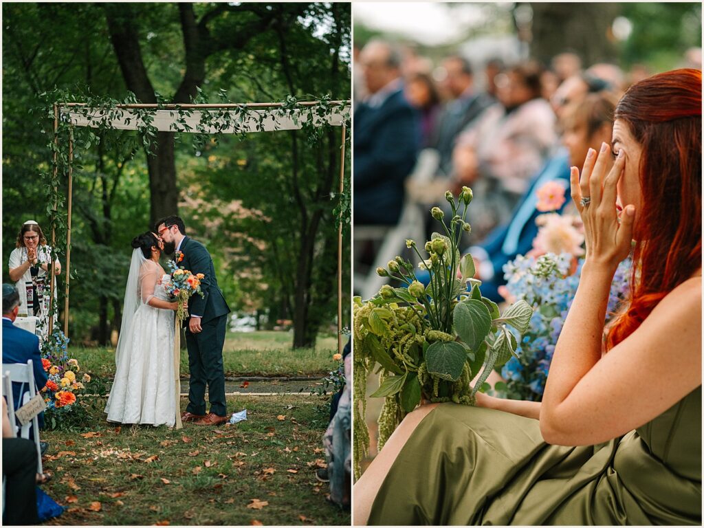 A bride and groom share their first kiss at a Bartram's Garden wedding.