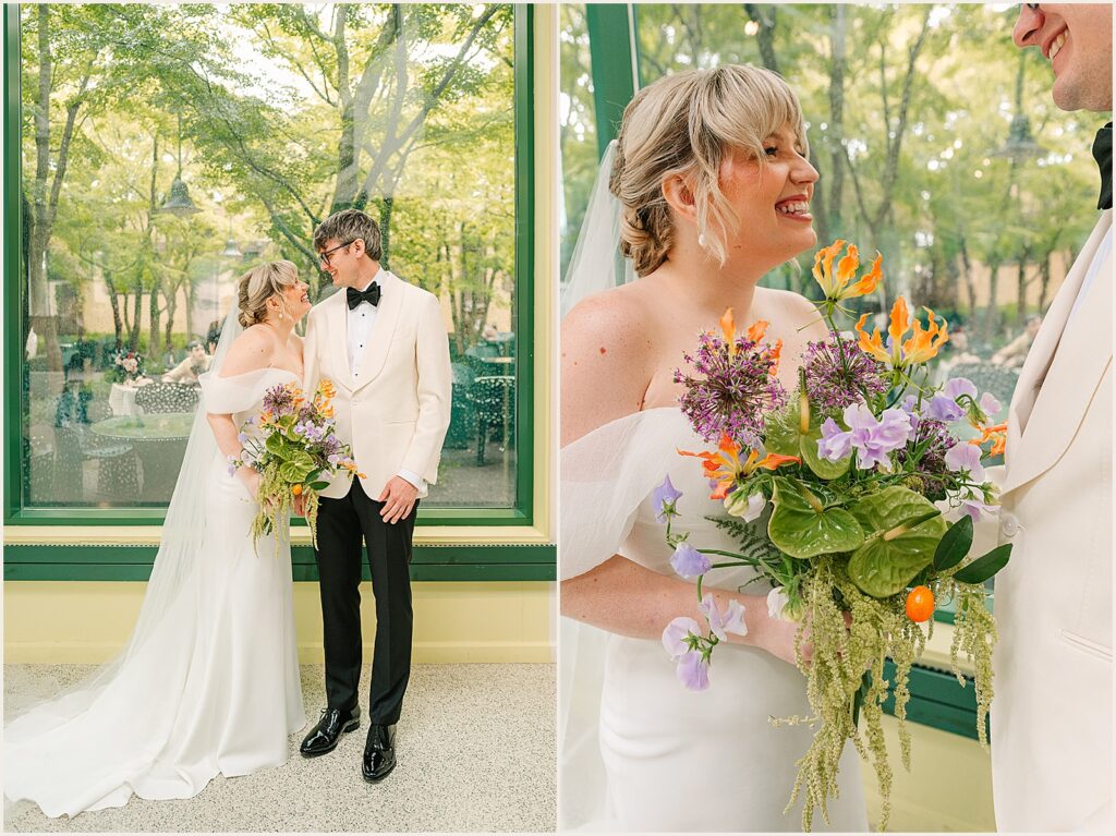 A bride holds a bouquet and laughs in a sunny room before a Grounds for Sculpture wedding.