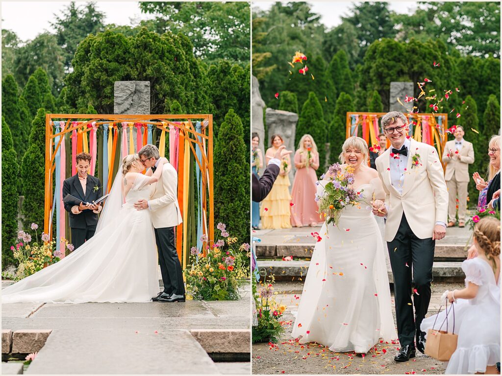 A bride and groom kiss at the end of their wedding ceremony.