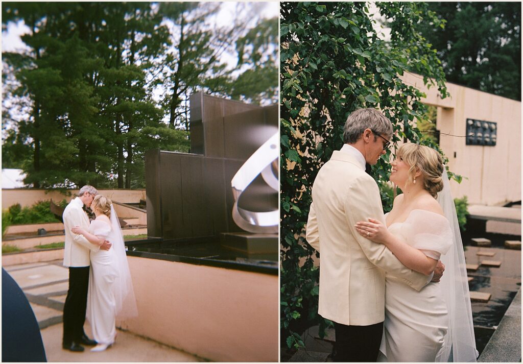 A bride and groom pose beside a metal sculpture at their Grounds for Sculpture wedding.