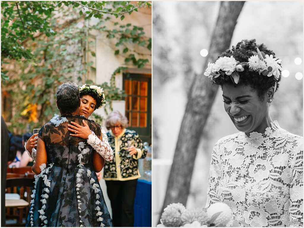A bride hugs her mother in the courtyard of a Philadelphia wedding venue.