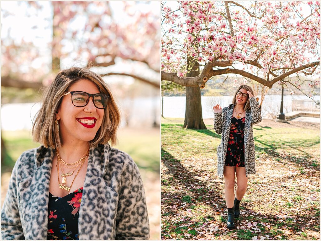 A Philadelphia writer poses for author headshots beneath a cherry tree.