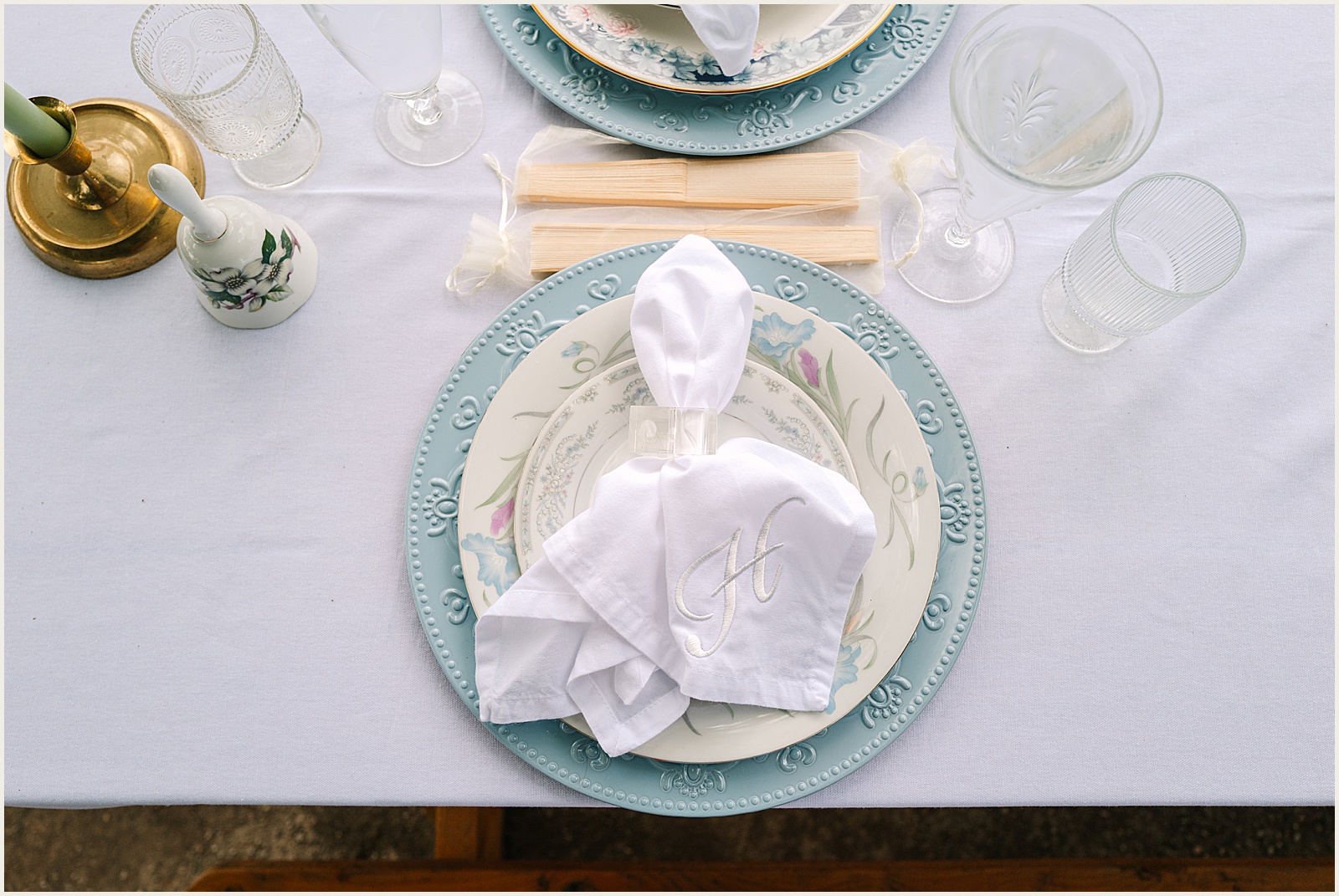 A table is set with vintage wedding decor.
