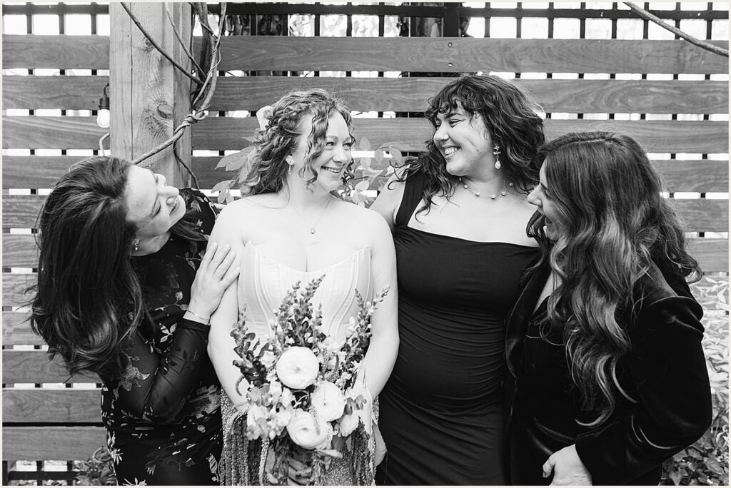 A bride poses with friends after her Philadelphia wedding.