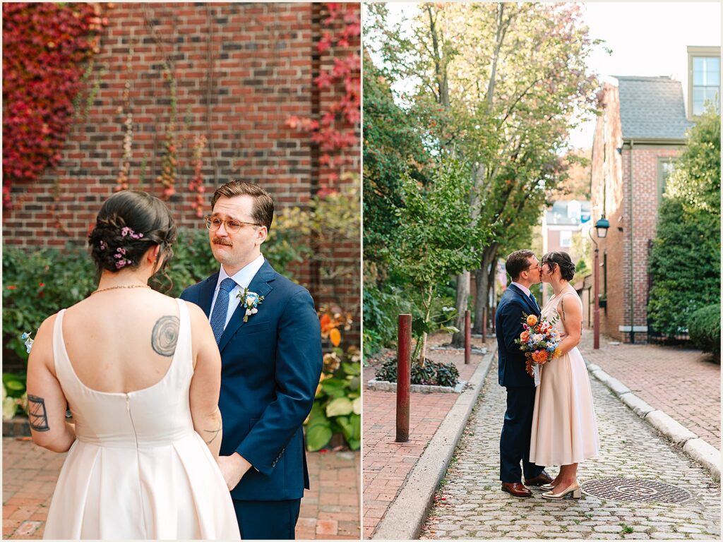 A bride and groom kiss on a cobblestone street in Old City Philly.