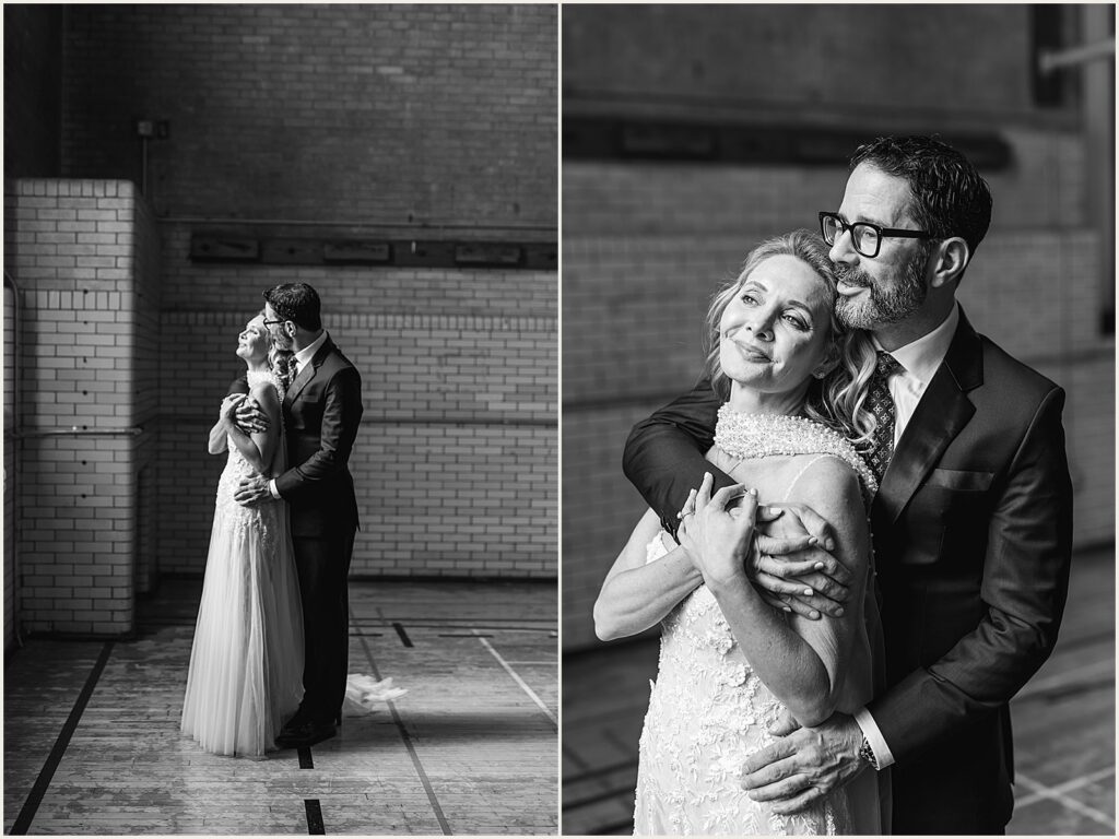 A bride leans against a groom and smiles.
